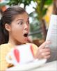 shocked-woman-reading-newspaper-vert_sqh0zm.jpg